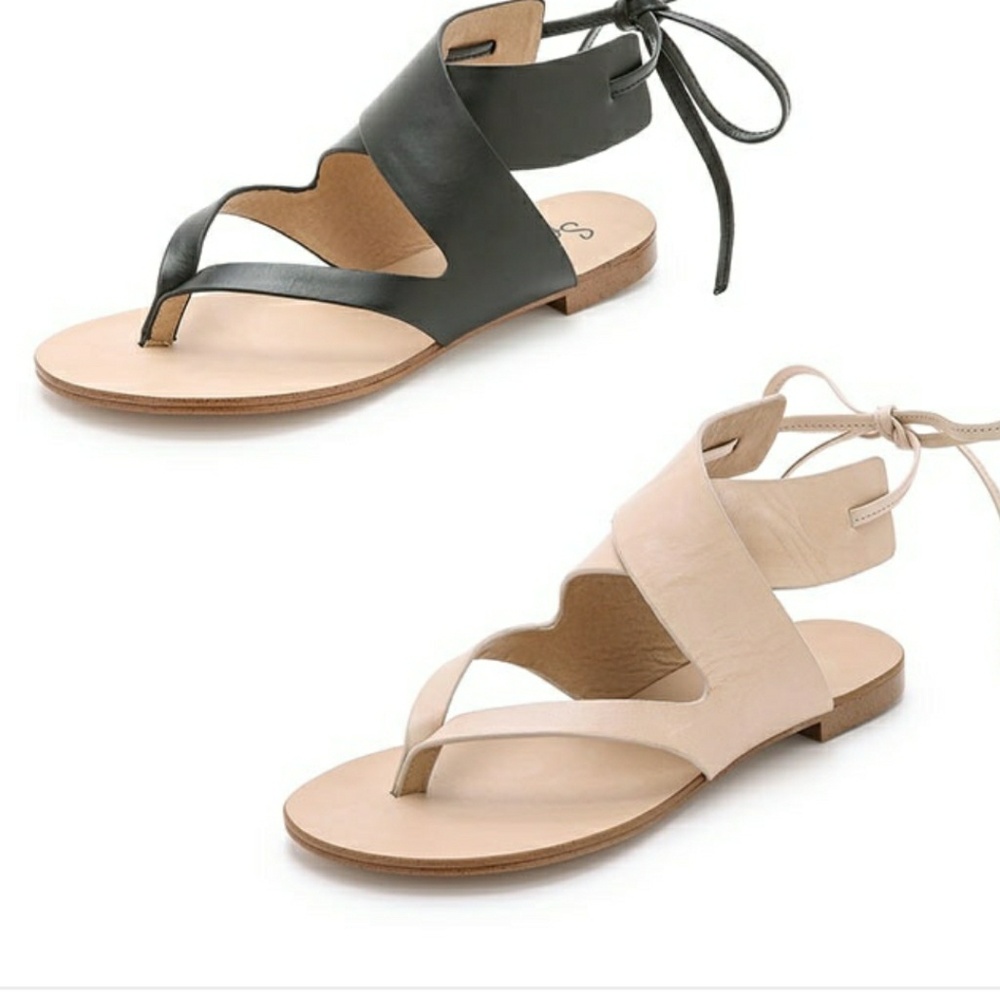 Woman's black Roman styled sandals